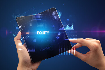 Businessman holding a foldable smartphone with EQUITY inscription, successful business concept