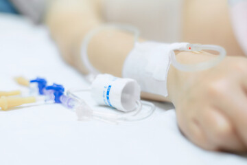 Close up of a woman patient in hospital with saline intravenous