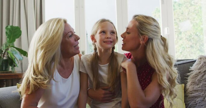 Caucasian woman spending time with her mother and her daughter