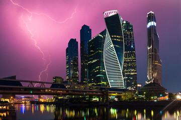 Naklejka premium lightning in a thunderstorm over Moscow City