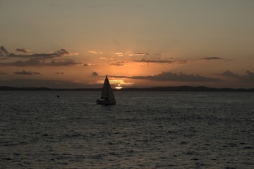 
a boat and the sunset