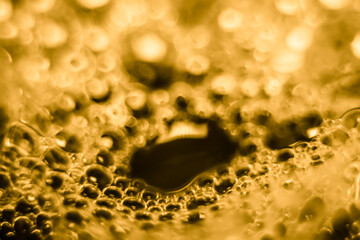 bubbles soap on water surface, shine with a bright, shimmering reflected light.