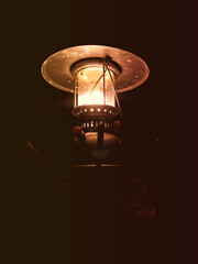 old fashioned lantern with the warm light