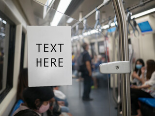 .Blank white ads space advertising board for text on subway or sky train, copy space, traveling in the city ..