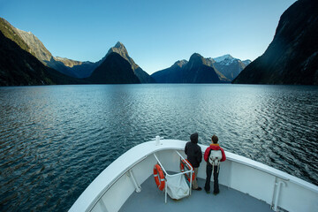 Traveller with beautiful scenic of milford sound in fiordland national park new zealand.