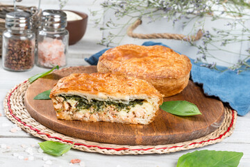 Oven cut meat and herbs pie cooked in the oven