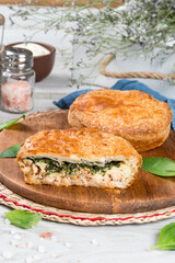 Oven cut meat and herbs pie cooked in the oven