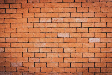 Old grunge brown stone brick wall texture abstract background.