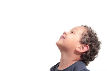 boy looking up to the sky stock photo