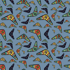 Seamless pattern vector of tribal motif art style boomerang on tribal pastel background for making many kinds of artwork, printing or textile