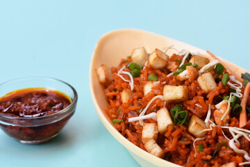 Schezwan paneer fried rice with schezwan sauce,Chinese fried rice with paneer,indo-chinese cuisine dishes. selective focus