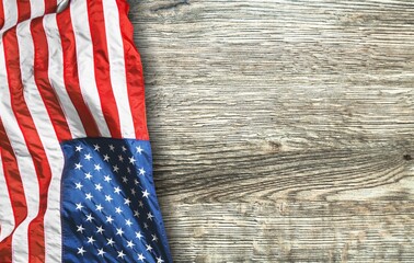 American waving flag on wooden desk