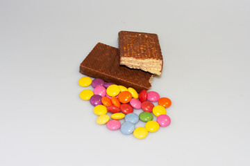 colorful chocolate candies, cookies and chocolate table