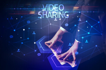 Navigating social networking with VIDEO SHARING inscription, new media concept