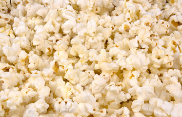 Scattered salted popcorn, texture background