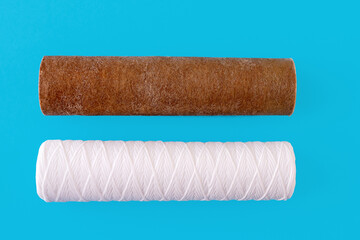 Before and after filtering. Two water cartridge filter for tap water clearing and treating