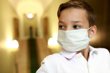 Kid wearing protection mask in museum