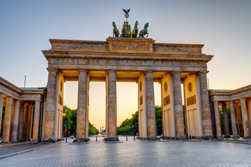 The historic Brandenburg Gate in Berlin at sunset with no people