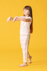 Little sleepwalker on color background