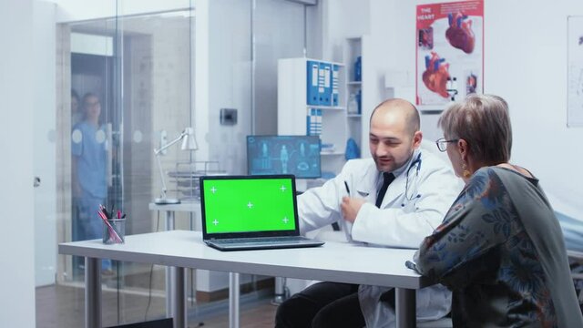 Green screen consultation at doctor in modern privat clinic. Mockup mock-up isolated background ready to be removed chroma key keying for your app or advertisement