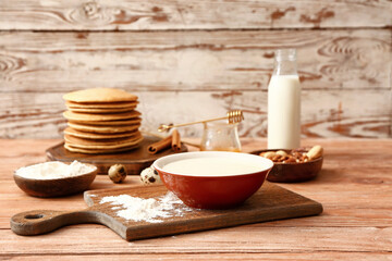 Ingredients for pancakes on table