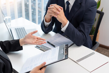 confident businessman sitting in front of office manager talk conducting to interviewer with...