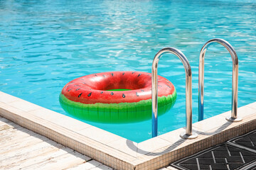 Fototapeta na wymiar Inflatable ring in swimming pool