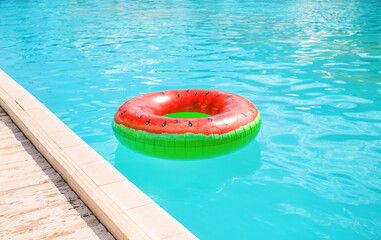 Fototapeta na wymiar Inflatable ring in swimming pool