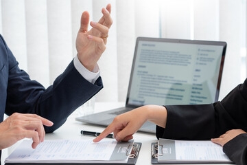 confident businessman sitting in front of office manager talk conducting to interviewer with colleague or boss for business