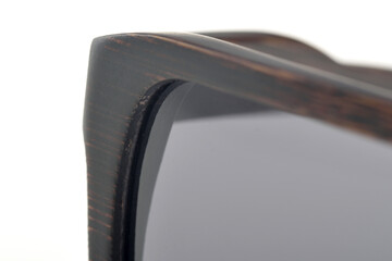 Close-up of part of wooden sun glasses