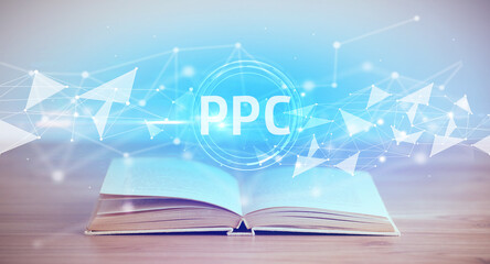 Open book with PPC abbreviation, modern technology concept