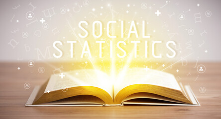Open book with SOCIAL STATISTICS inscription, social media concept