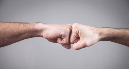  Close-up. Two fists hitting each other. Fight