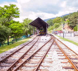 Fototapeta na wymiar Narrow-gauge heritage railway, Tourist Attraction, old-fashioned train, , Mokra Gora Station - Serbia