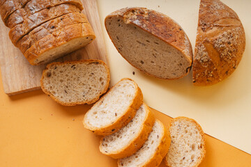 Group of many type of bread on a plate and cooking flour.