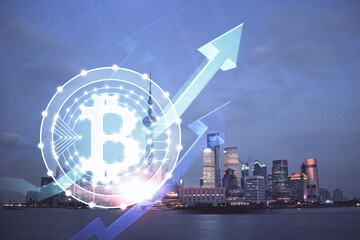 Multi exposure of cryptocurrency theme hologram drawing and city veiw background. Concept of blockchain and bitcoin.