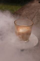 coffe latte cup on a wood table.