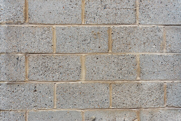 Grey grunge brick wall background