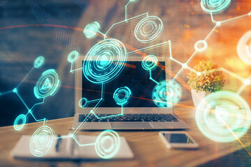Computer on desktop with social network theme icon. Multi exposure. Concept of international connections.
