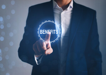 Businessman touching Benefits digital icon. Benefits, personal development concept.