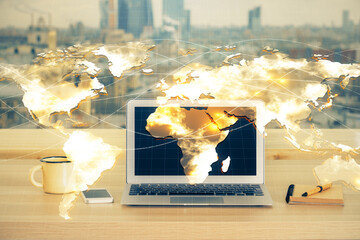 Multi exposure of business theme icons and table with computer background. Concept of success.