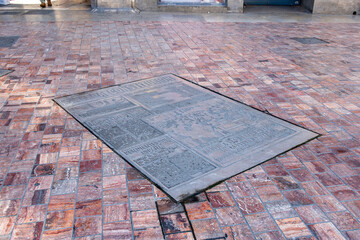 MALAGA, Spain. Plaza de la Constitucion in Malaga with old newspaper front page tile panel dated 7 December 1978, the day that the Spanish constitution was approved