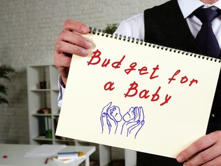 Financial concept meaning Budget For A Baby with sign on the piece of paper.