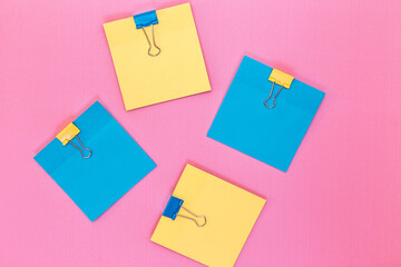 colorful sticky notes on a cork board