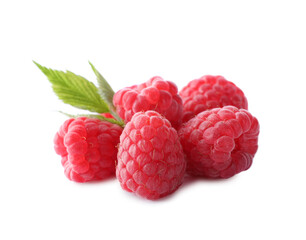 Pile of fresh ripe raspberries with leaves isolated on white