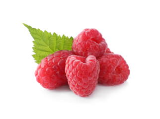 Pile of fresh ripe raspberries with leaves isolated on white