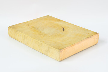 a wooden chopping board on a white background