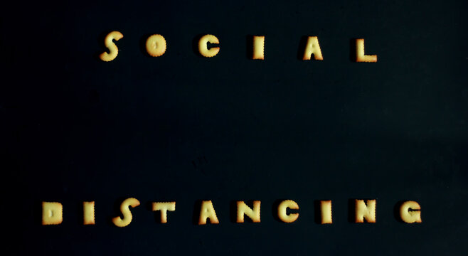 The top-down of the snack is the character, arranged as ideas and concepts about social distancing to protection during the coronavirus 2019 disease, on a black background, copy space for text. - Powered by Adobe