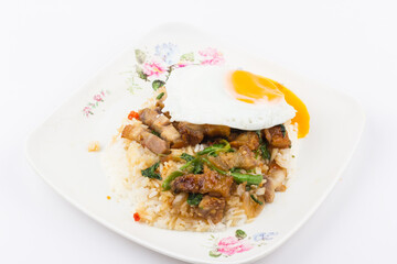 Rice topped with stir-fried pork and basil with fried egg