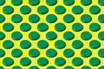 Colorful pattern: many green metal bottle caps on yellow background, close-up